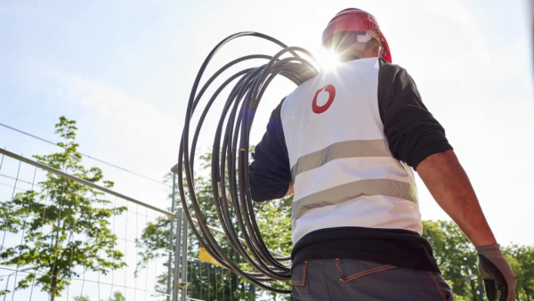 Vodafone Worker laying cables